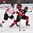 ZUG, SWITZERLAND - APRIL 26: Canada's Kyle Capobianco #28 fights for position against Switzerland's Makai Holdener #14 during bronze medal game action at the 2015 IIHF Ice Hockey U18 World Championship. (Photo by Matt Zambonin/HHOF-IIHF Images)

